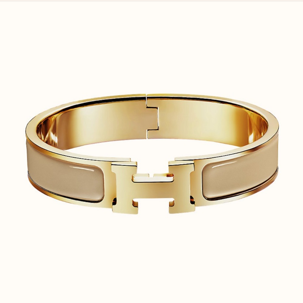 Hermès Clic H bracelet, gold and nude.